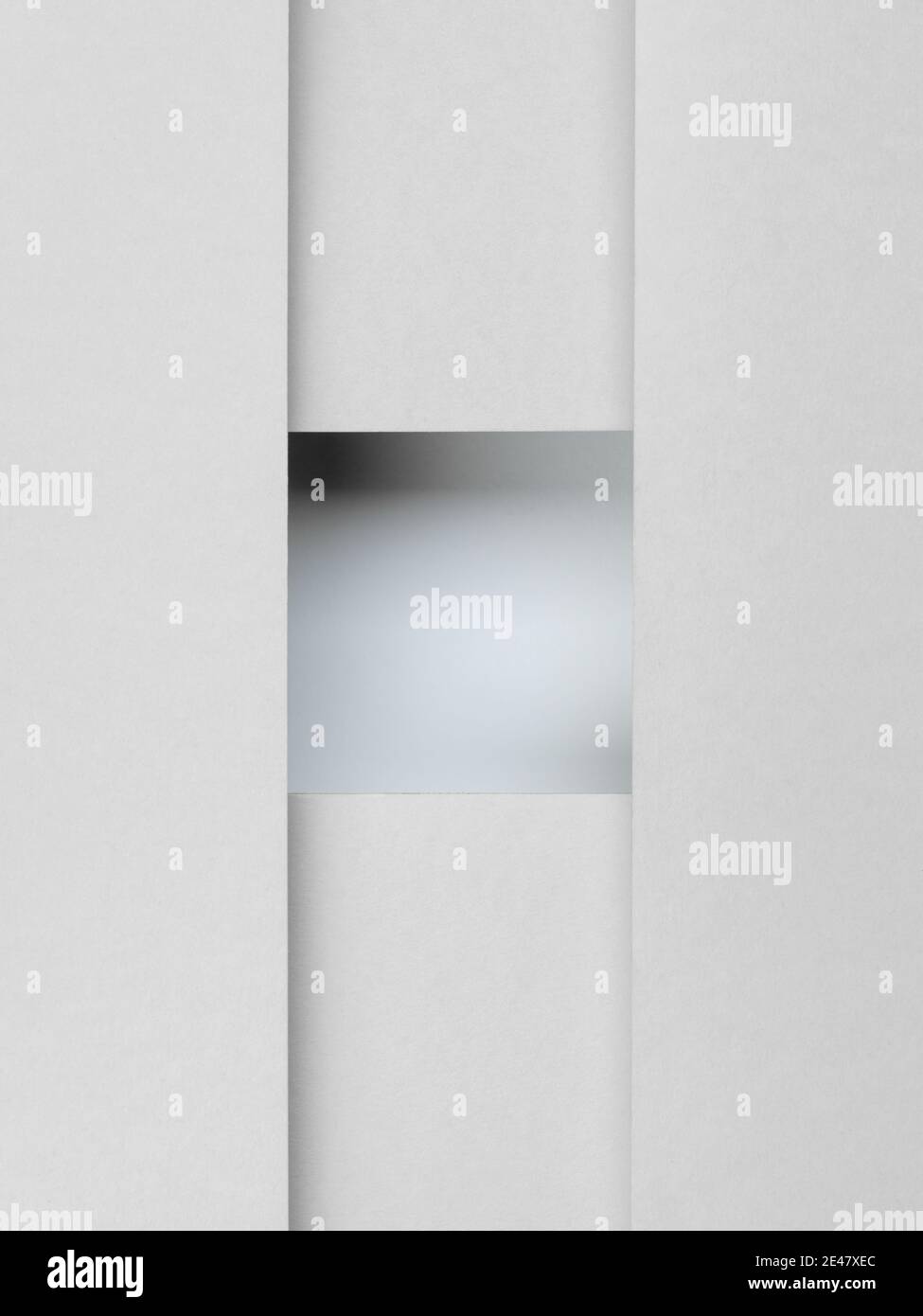 Sfondo di carta astratto fatto da fogli di carta e sfumature di illuminazione formare un quadrato Foto Stock