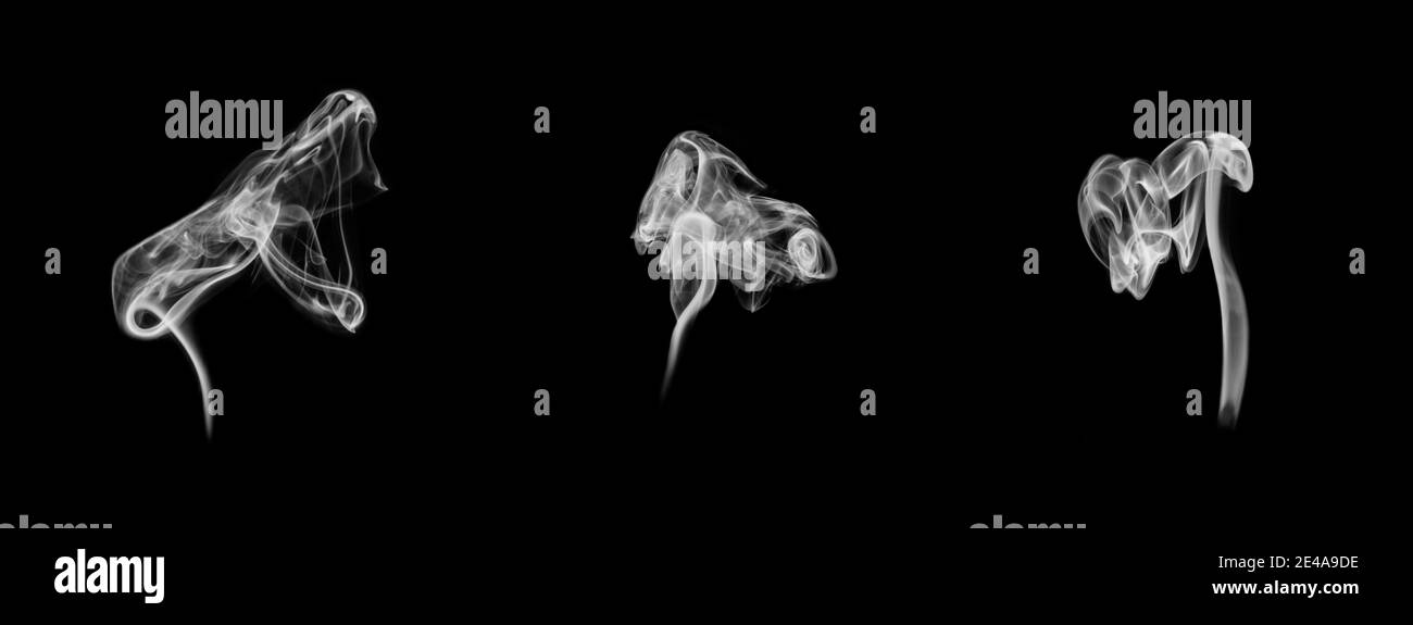 Variazioni di fumo isolate su sfondo nero Foto Stock