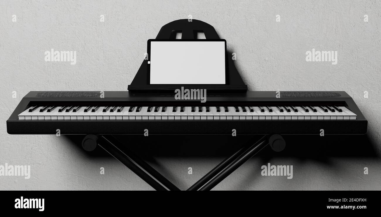 pianoforte elettronico su supporto in metallo con un tablet vuoto sul suo  supporto musicale per lezioni online. Derisione. rendering 3d Foto stock -  Alamy