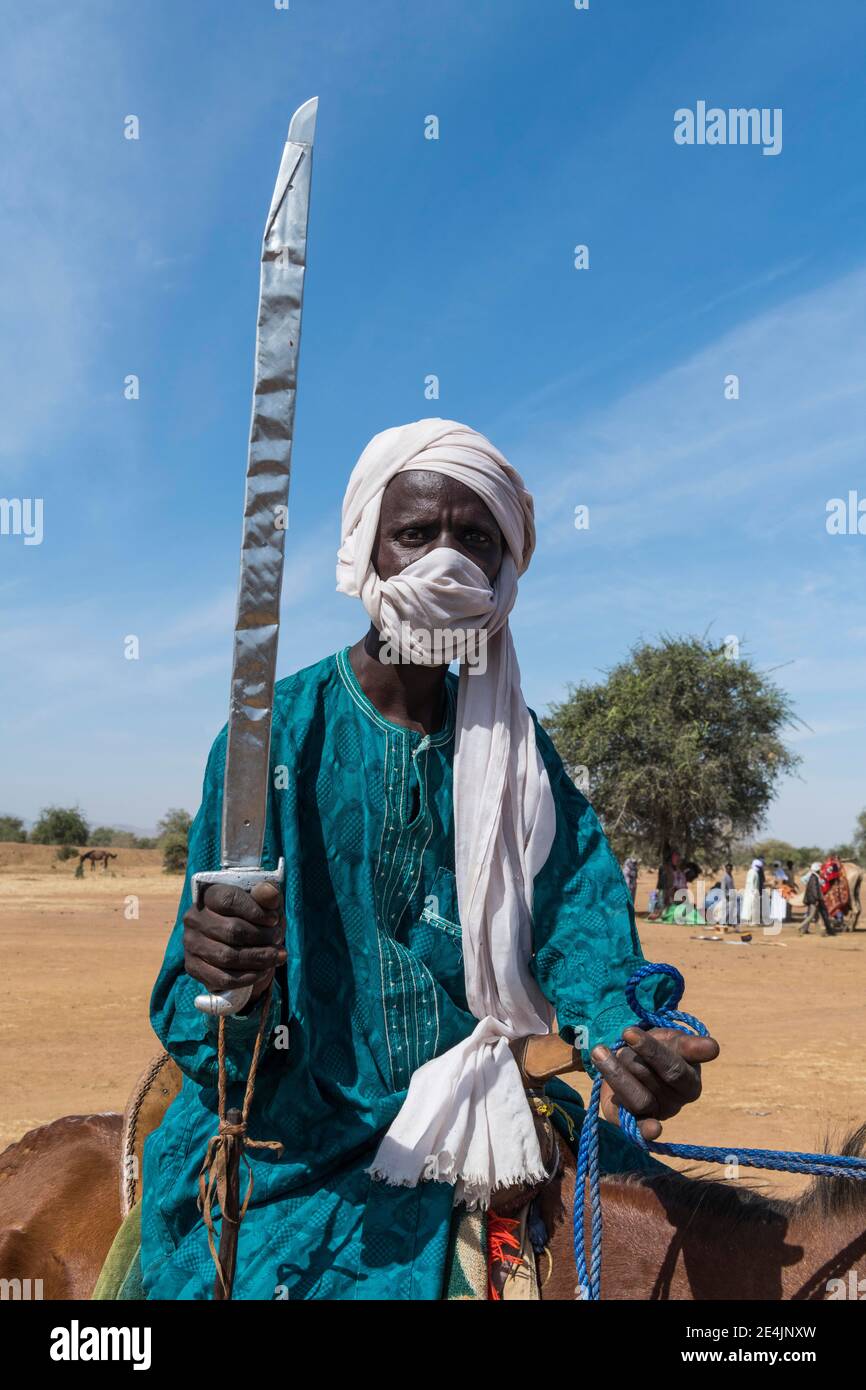 Cavaliere con spada, Sahel, Ciad Foto Stock