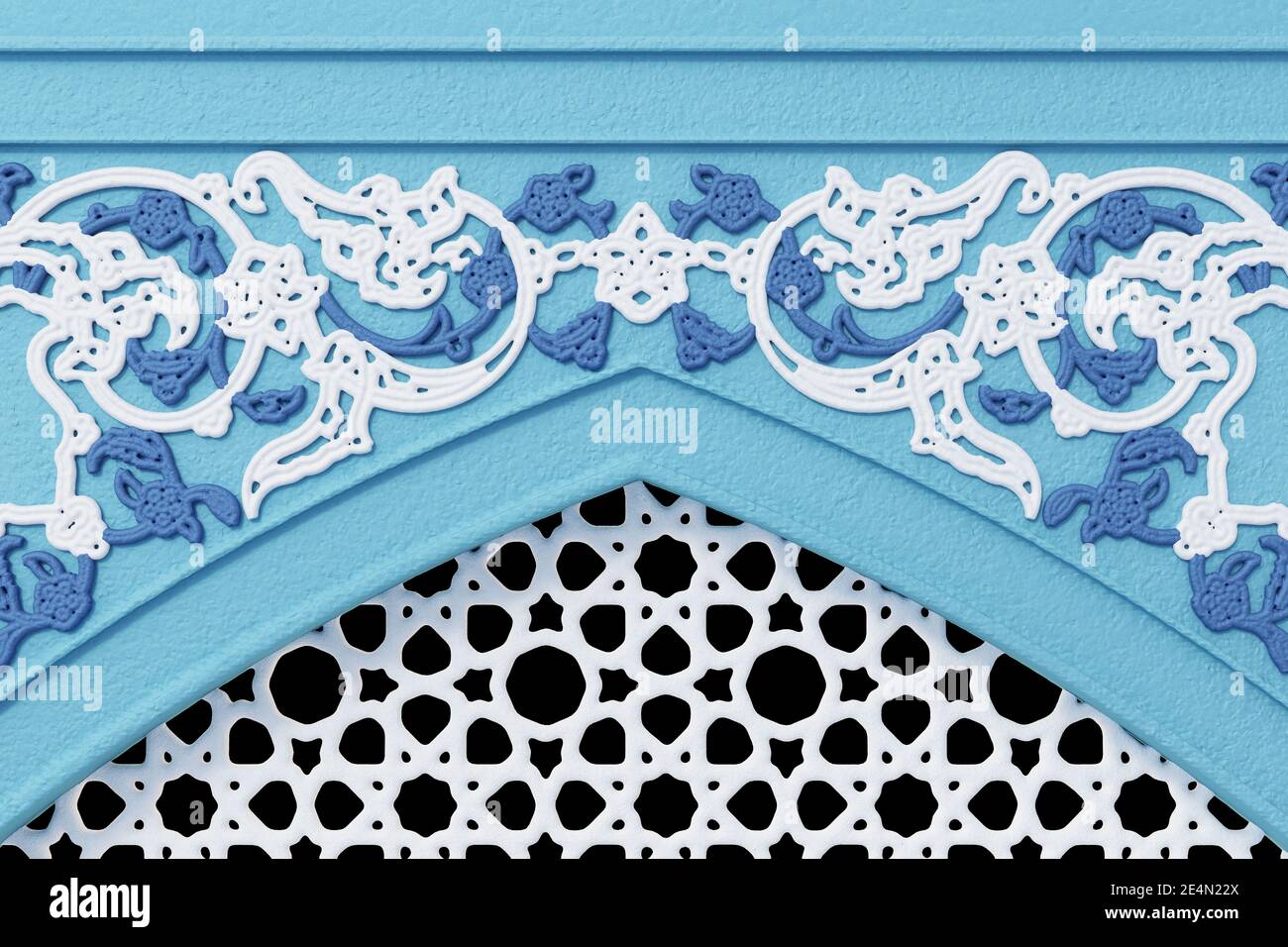 Disegno ornamentale su un arco islamico Foto Stock