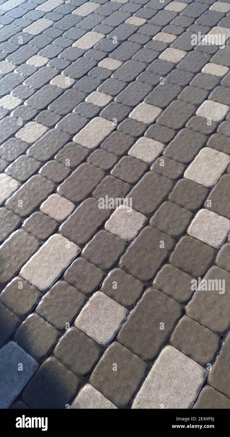 Ghiaccio in città - piastrelle ghiacciate Foto Stock