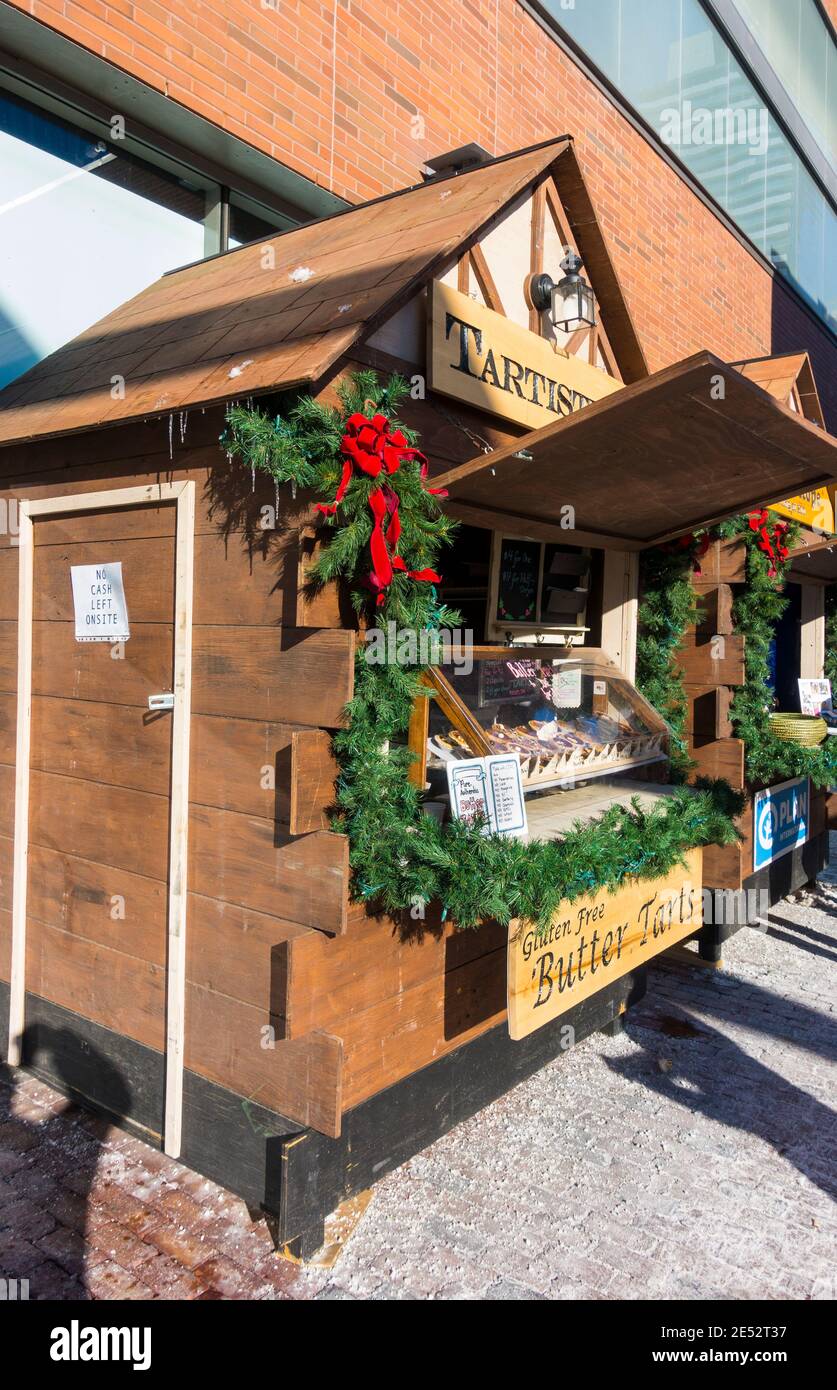 Un piccolo negozio che vende crostate di burro ad un Natale di Toronto mercato Foto Stock