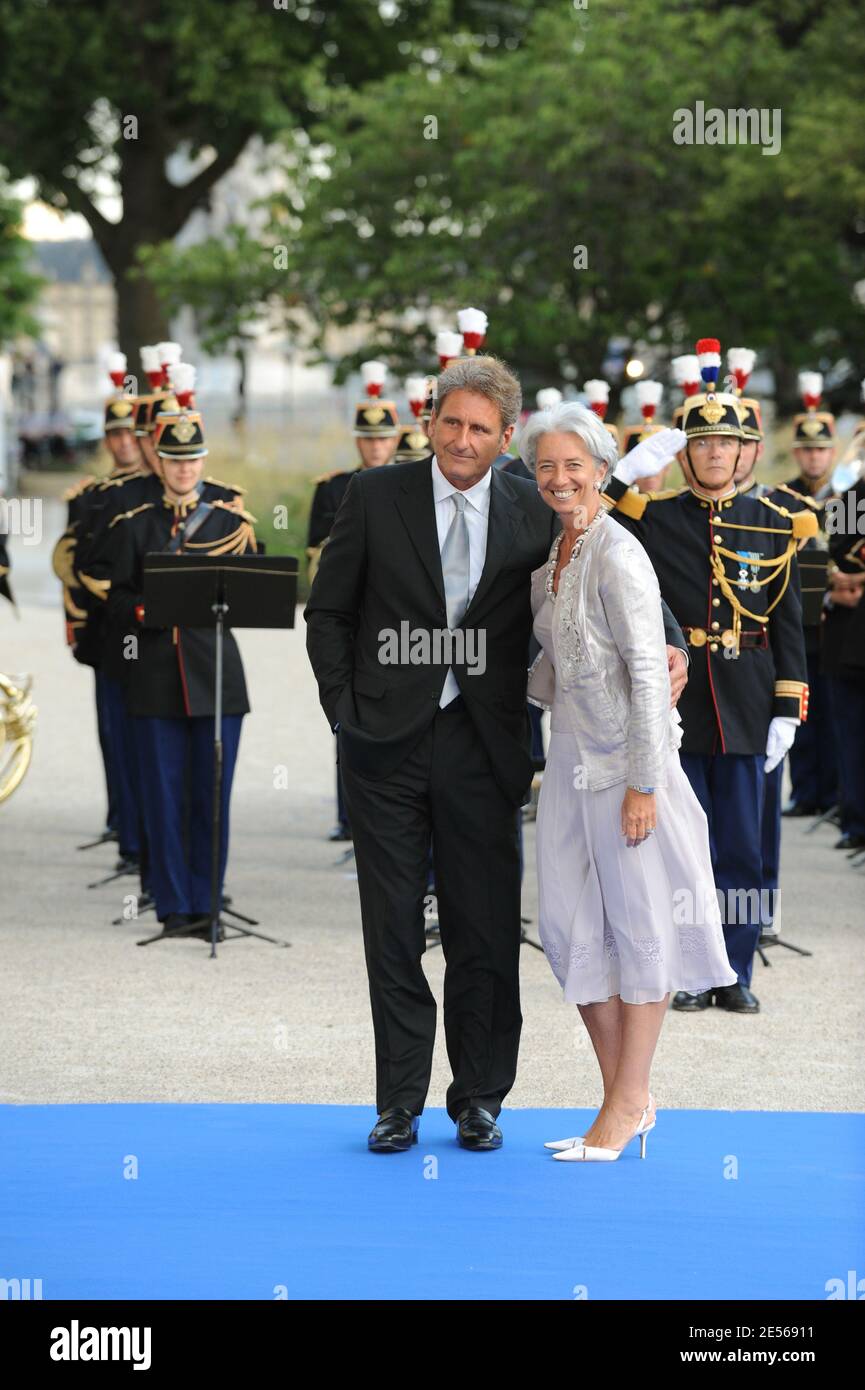 Il ministro francese dell'Economia Christine Lagarde e il marito arrivano per una cena ospitata dai Capi di Delegazione, dai loro coniugi e dai Ministri al Petit Palais, dopo aver partecipato al vertice dell'Unione di Parigi per la fondazione del Mediterraneo tenutosi a Parigi il 13 luglio 2008. Foto di Abd Rabbo-Mousse/ABACAPRESS.COM Foto Stock