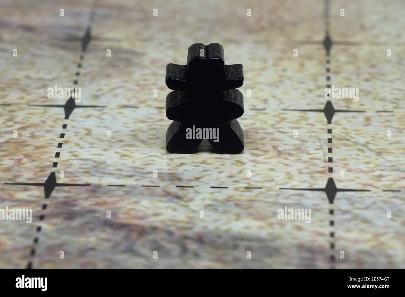 Meeple, questo è un token di gioco da tavolo nero di colore a forma di un Cowboy Foto Stock