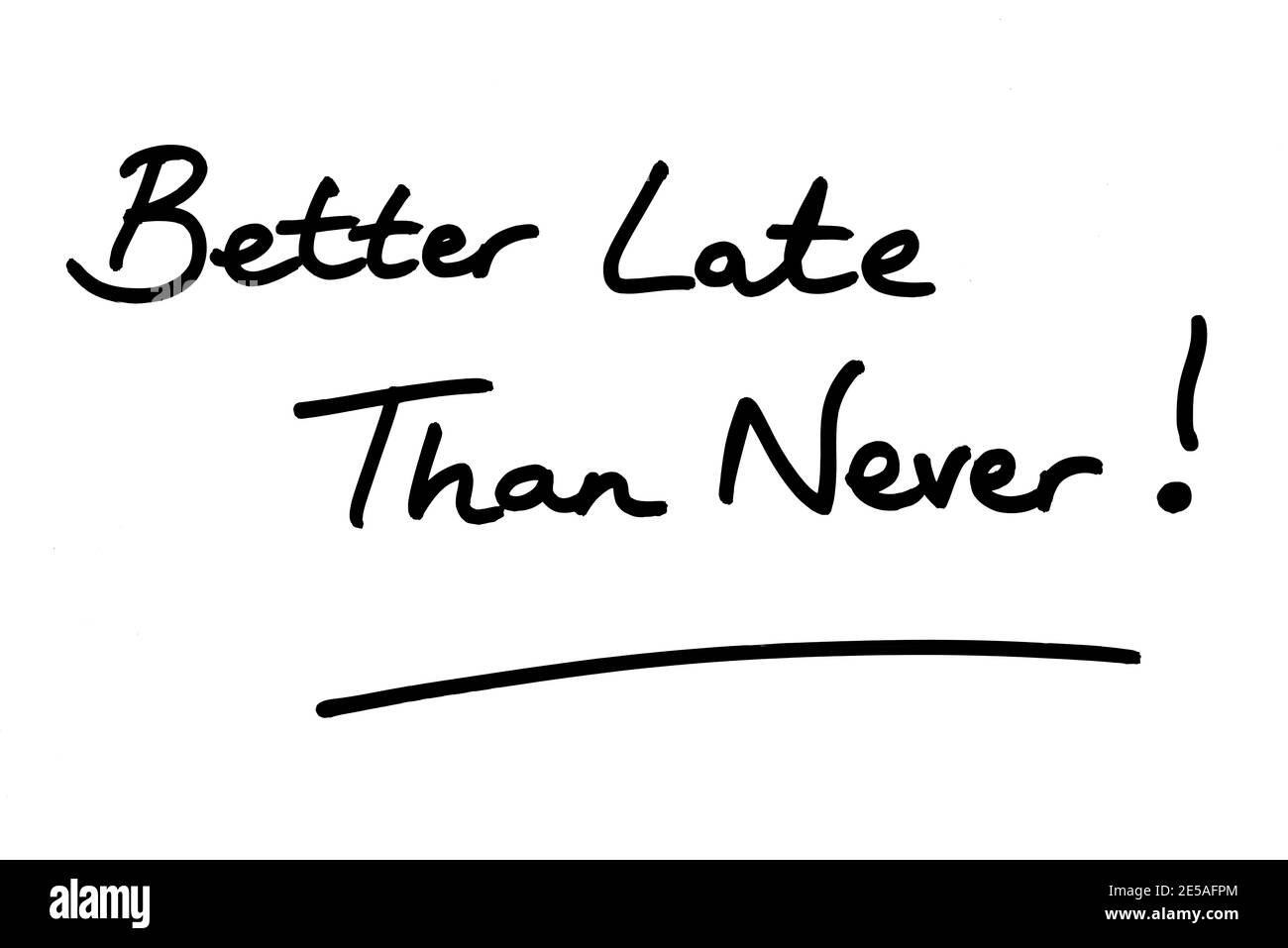 Meglio tardi che mai! manoscritto su sfondo bianco. Foto Stock