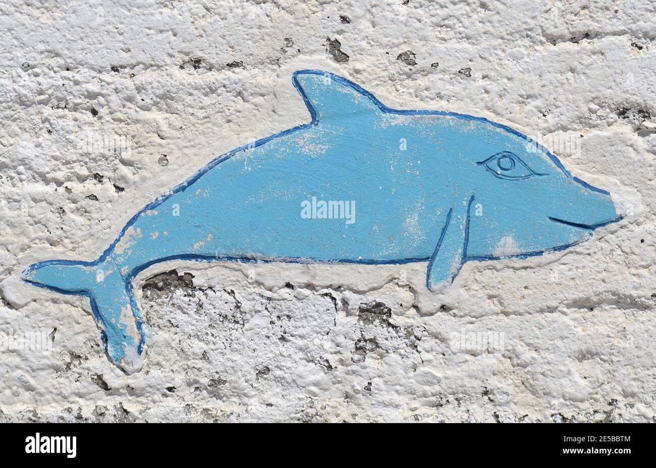 Murale dei delfini dipinto su un muro a Creta, Grecia Foto Stock
