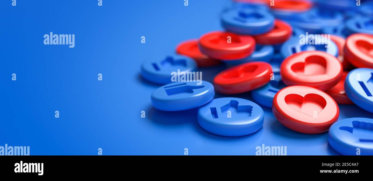 Un mix di pulsanti simili con un cuore inciso in rosso e pollici in blu su un mucchio. Sfondo blu. Concetto di social media. Formato banner Web con COP Foto Stock