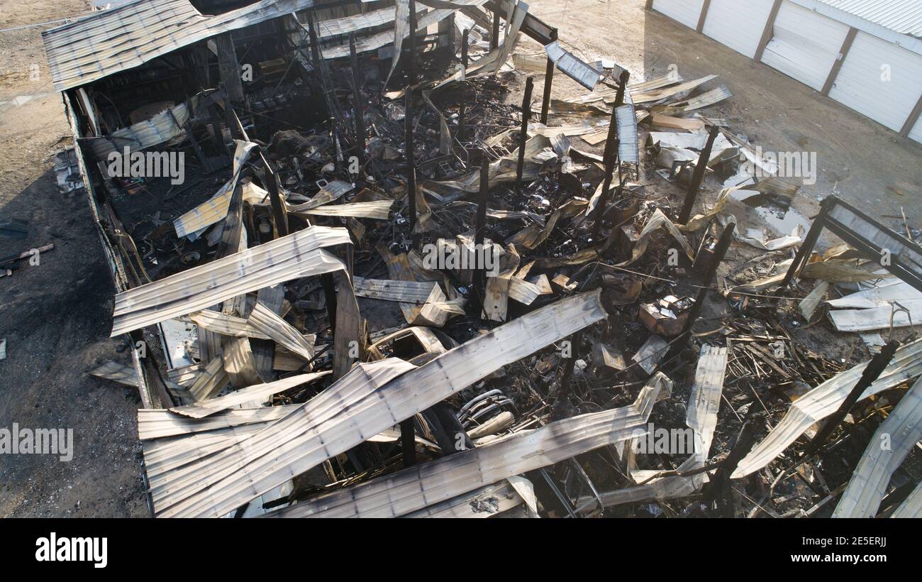 la gente ora avrà bisogno di presentare la richiesta di assicurazione a causa di danni da incendio Foto Stock