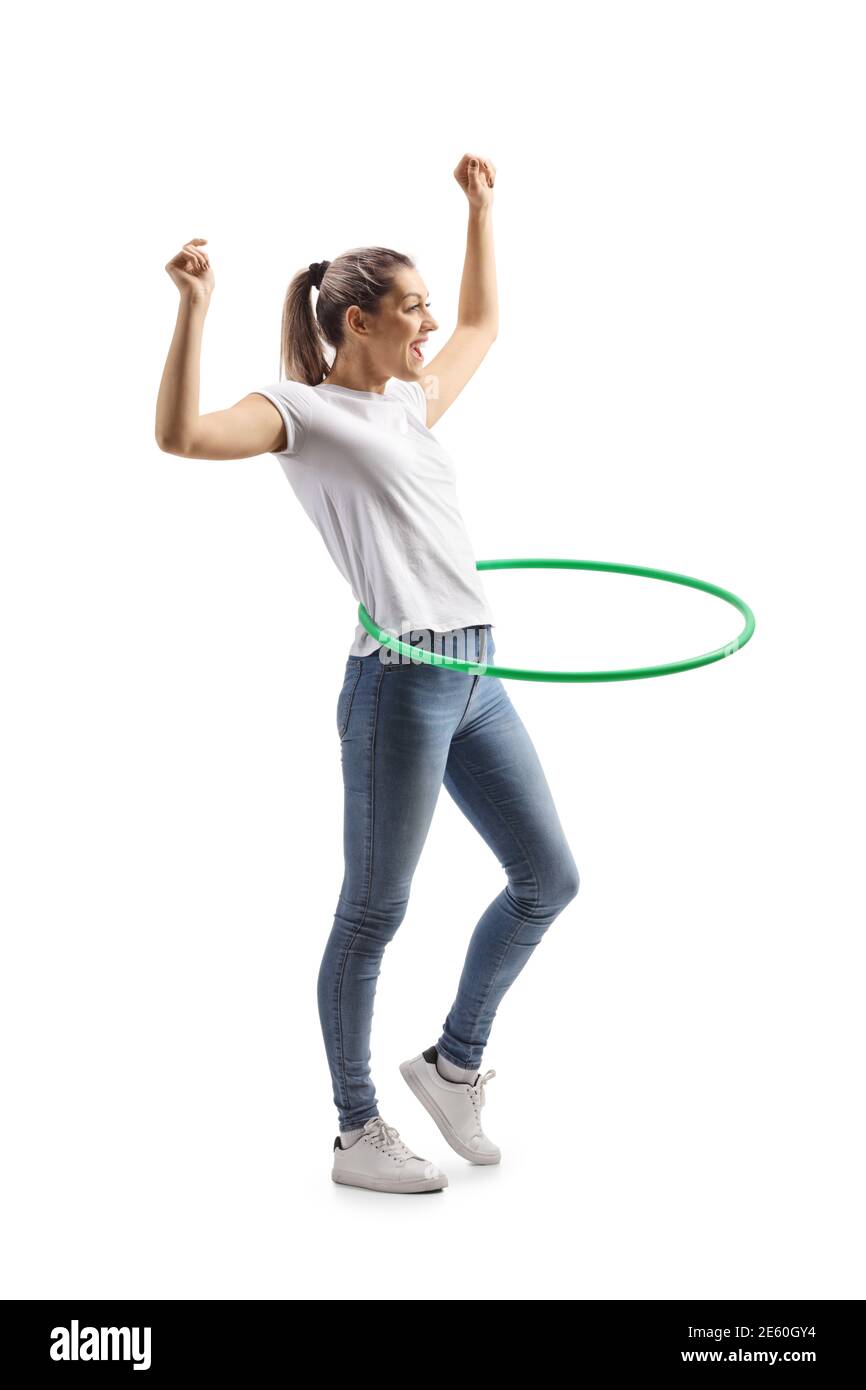 Giovane donna Cheeful che gira un hula con le mani in su isolato su sfondo bianco Foto Stock Giovane donna Cheeful che gira un hula con le mani in su isolato su sfondo bianco Foto Stock