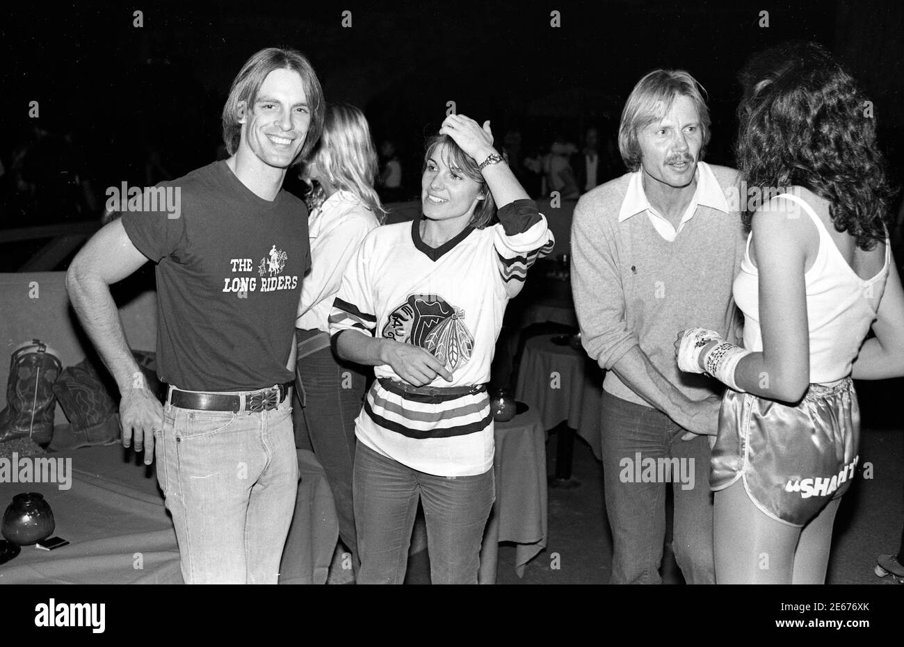 Keith Carradine, Susan St. James e Jon Voigt a Roller Rink per eventi a sostegno di era, Los Angeles, CA circa anni '70. Foto Stock