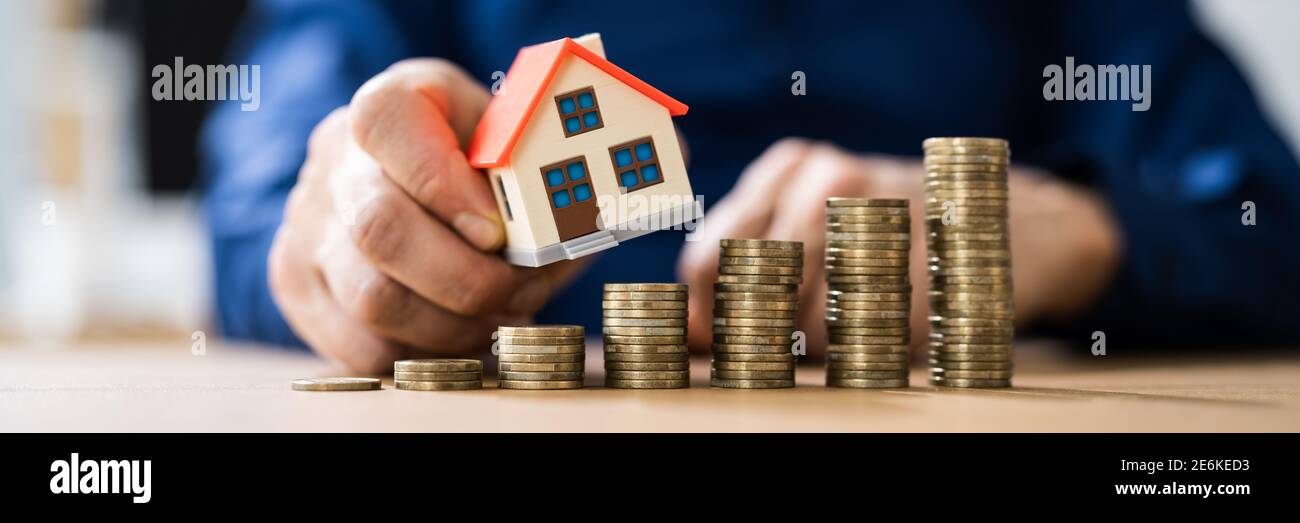 Investimenti immobiliari e tassa di proprietà. Prezzo e Economia Foto Stock