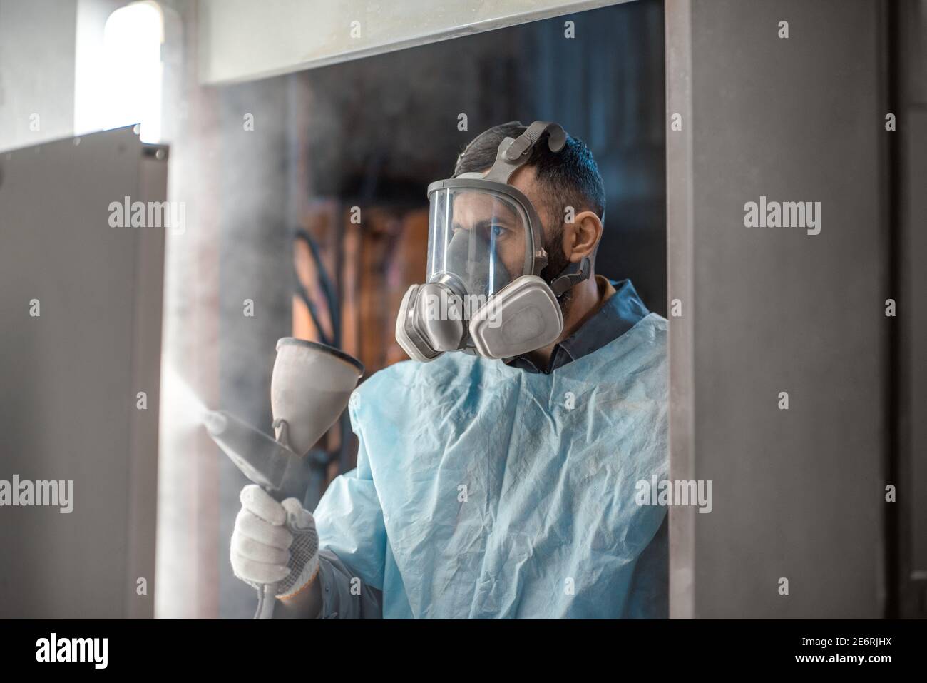 Processo di verniciatura a polvere di prodotti metallici Foto Stock