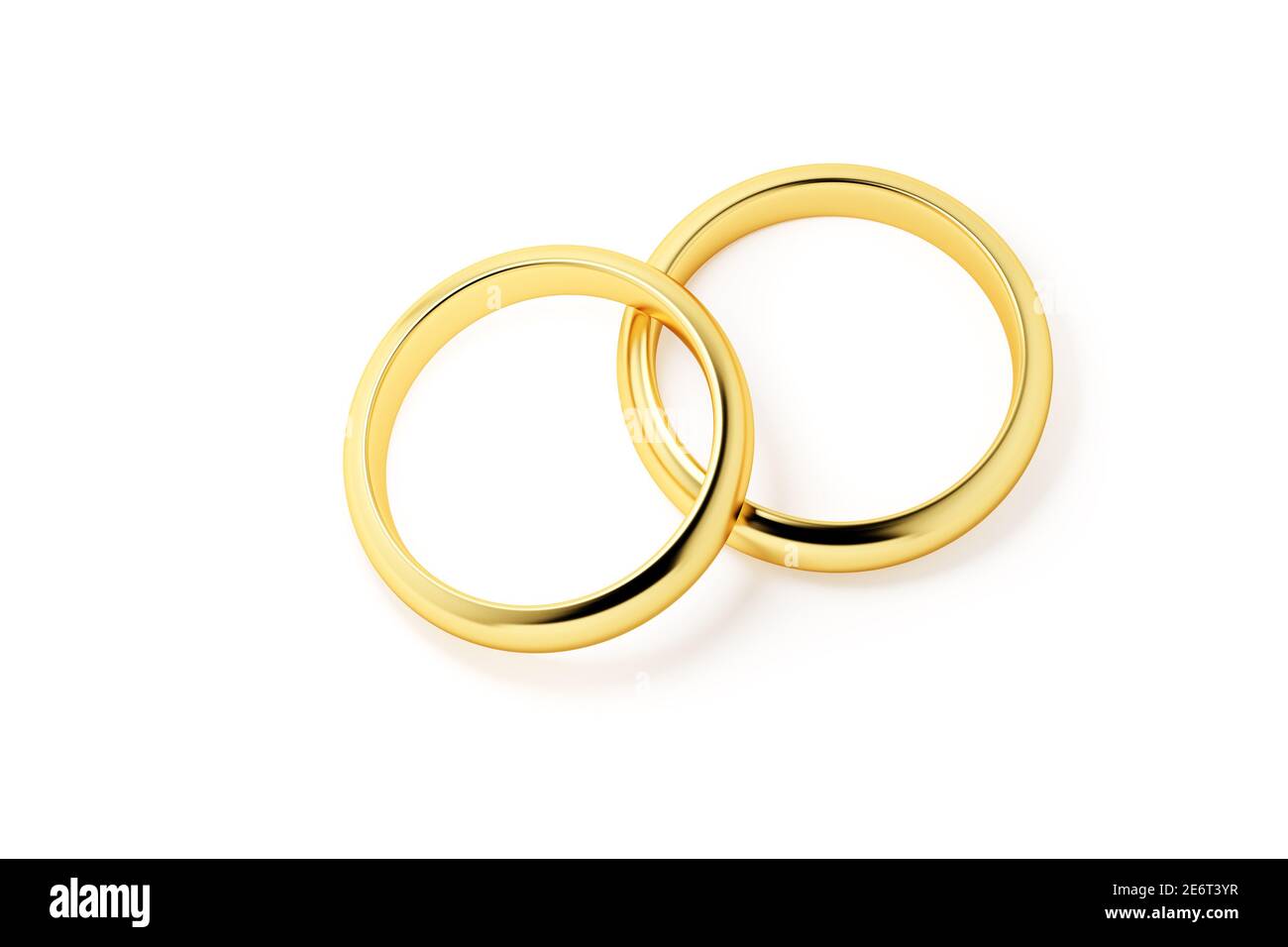 Due anelli dorati isolati su sfondo bianco. Foto Stock