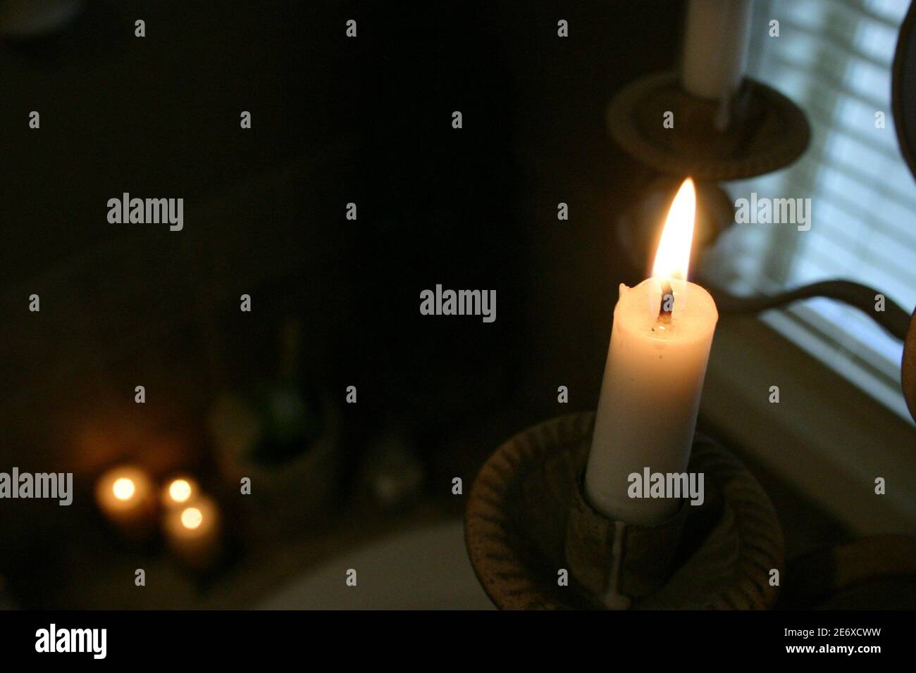 A lume di candela Foto Stock
