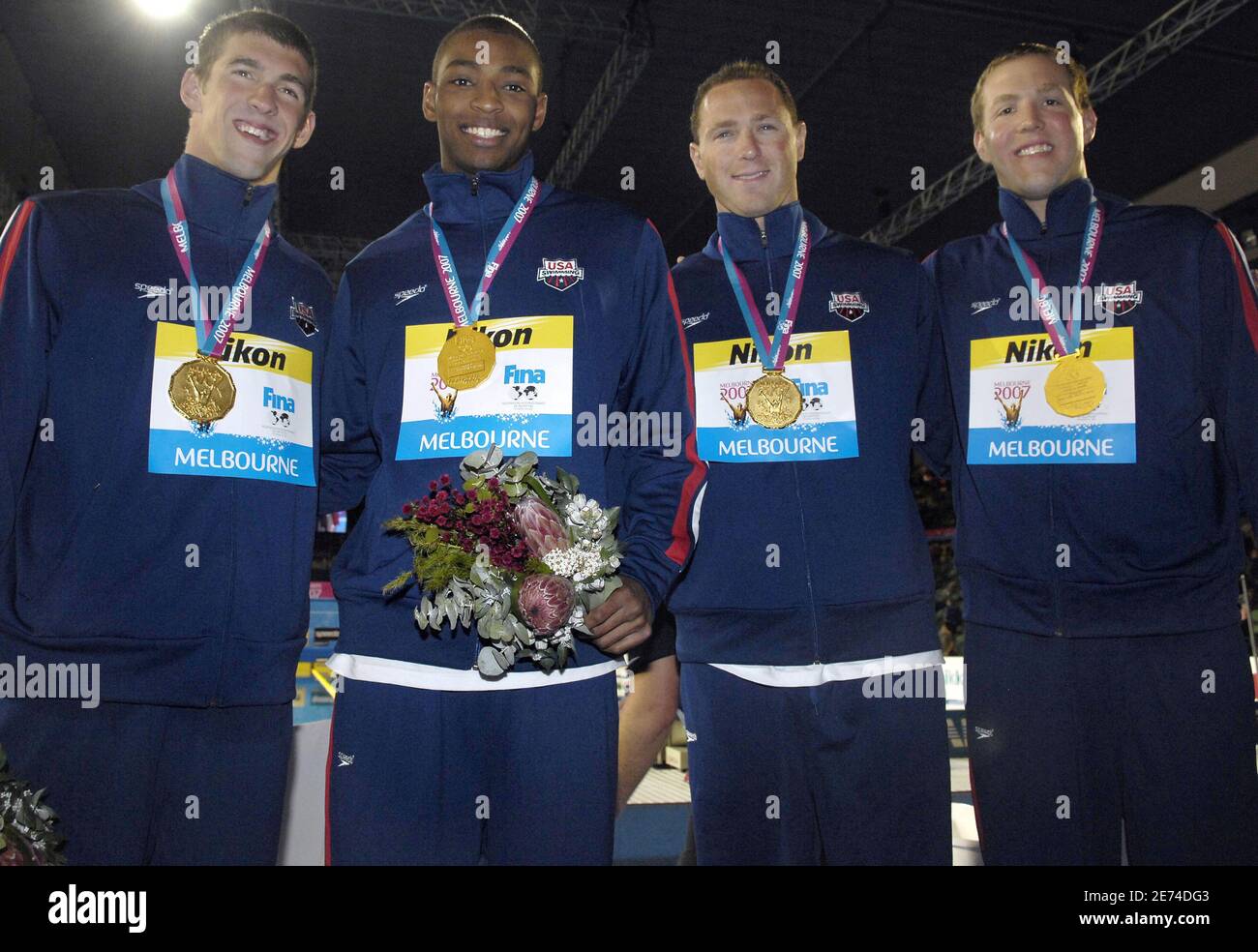 La squadra degli Stati Uniti con Michael Phelps, Neil Walker, Cullen Jones e Jason Lezac vince la medaglia d'oro sulla staffetta freestyle 4x100 metri maschile durante il 12° Campionato del mondo FINA, presso la Rod Laver Arena, a Melbourne, Australia, il 25 marzo 2007. Foto di Nicolas Gouhier/Cameleon/ABACAPRESS.COM Foto Stock