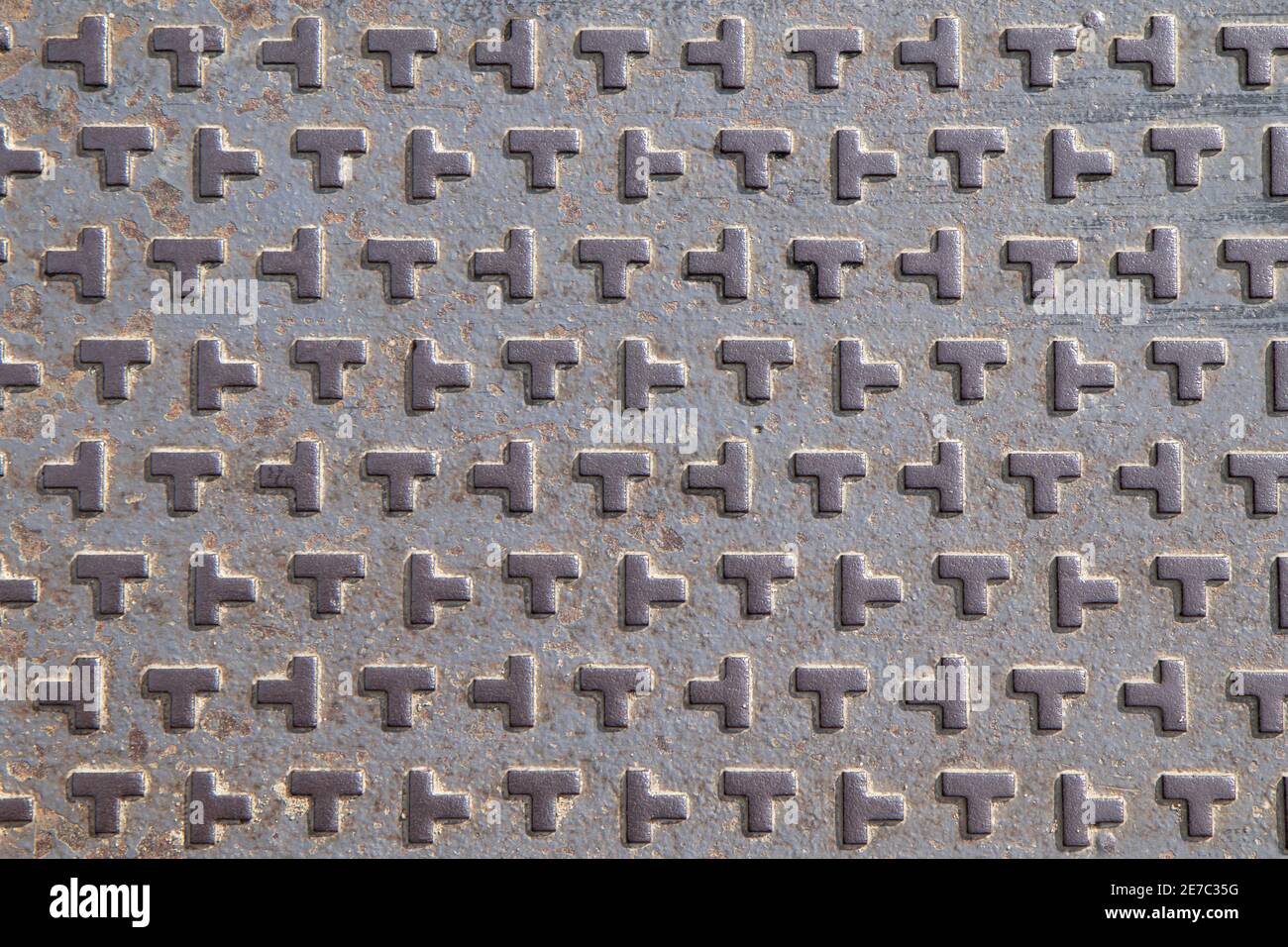 Fondo in tessuto metallico, piatto in metallo con quadrati. Immagine di sfondo metallico. Foto Stock