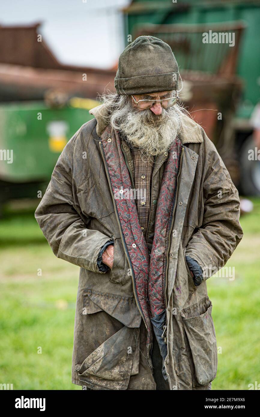 vecchio agricoltore con una barba Foto Stock