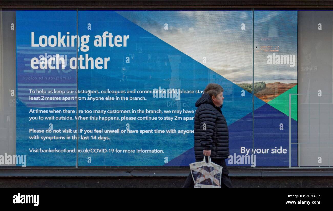 Glasgow, Scotland, UK.30th Gennaio, 2021, Lockdown Sabato ha visto la sincronicità o l'arte che rispecchia la vita. La miseria continua almeno la pioggia fermata come strade deserte nel centro città, le aree commerciali si affida in poster e wall art come un sostituto per la vita. Credit Gerard Ferry/Alamy Live News Foto Stock