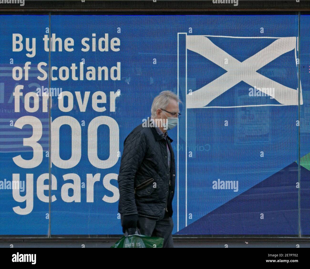 Glasgow, Scotland, UK.30th Gennaio, 2021, Lockdown Sabato ha visto la sincronicità o l'arte che rispecchia la vita. La miseria continua almeno la pioggia fermata come strade deserte nel centro città, le aree commerciali si affida in poster e wall art come un sostituto per la vita. Credit Gerard Ferry/Alamy Live News Foto Stock
