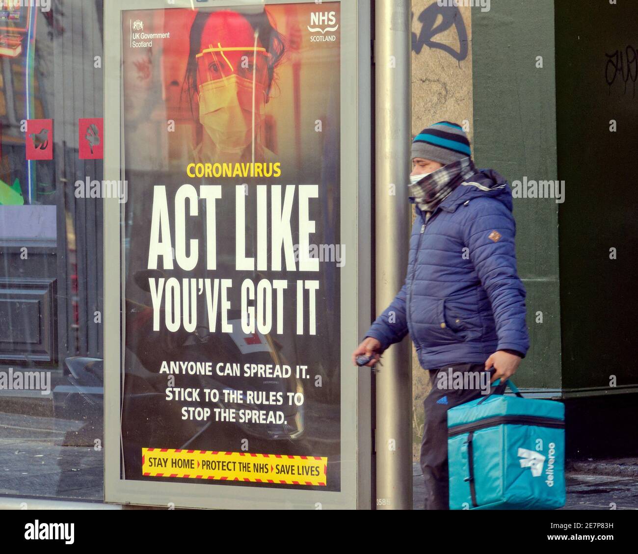 Glasgow, Scotland, UK.30th Gennaio, 2021, Lockdown Sabato ha visto la sincronicità o l'arte che rispecchia la vita. La miseria continua almeno la pioggia fermata come strade deserte nel centro città, le aree commerciali si affida in poster e wall art come un sostituto per la vita. Credit Gerard Ferry/Alamy Live News Foto Stock