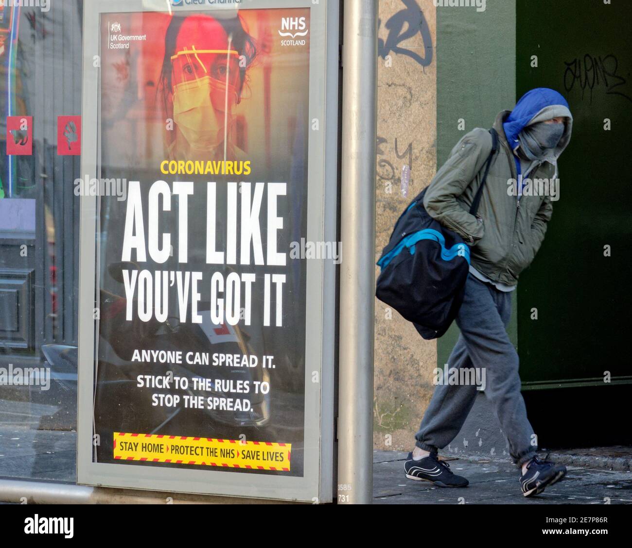 Glasgow, Scotland, UK.30th Gennaio, 2021, Lockdown Sabato ha visto la sincronicità o l'arte che rispecchia la vita. La miseria continua almeno la pioggia fermata come strade deserte nel centro città, le aree commerciali si affida in poster e wall art come un sostituto per la vita. Credit Gerard Ferry/Alamy Live News Foto Stock