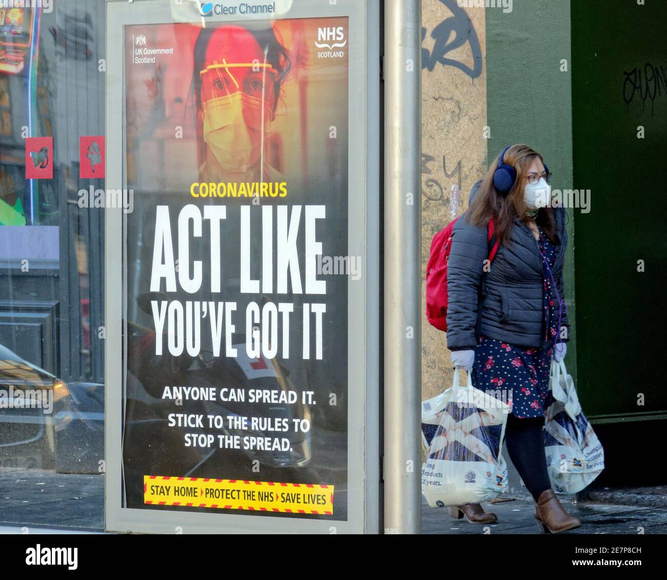 Glasgow, Scotland, UK.30th Gennaio, 2021, Lockdown Sabato ha visto la sincronicità o l'arte che rispecchia la vita. La miseria continua almeno la pioggia fermata come strade deserte nel centro città, le aree commerciali si affida in poster e wall art come un sostituto per la vita. Credit Gerard Ferry/Alamy Live News Foto Stock
