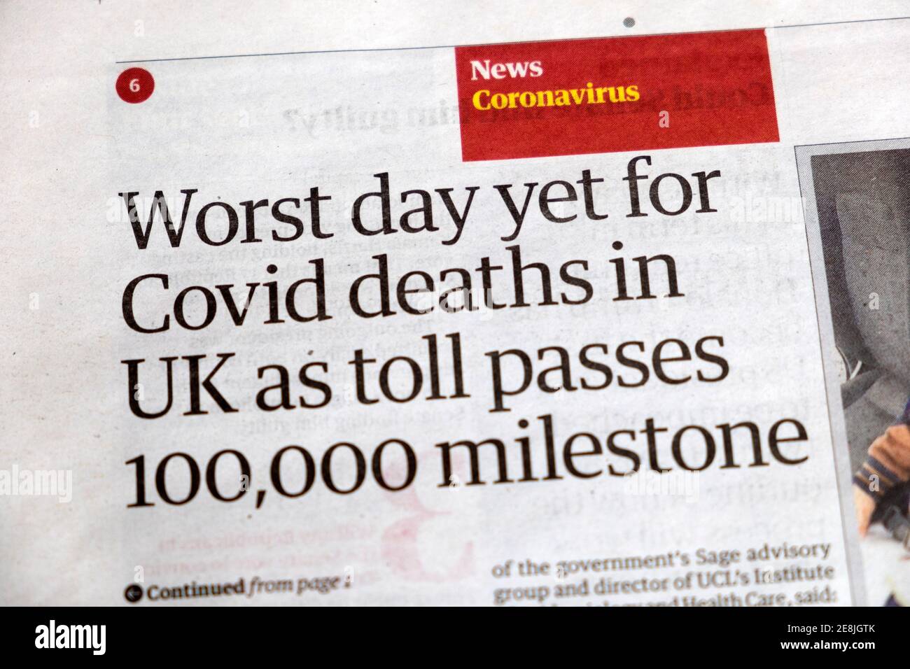 'Il giorno peggiore ancora per i decessi di Covid nel Regno Unito come tributo Supera 100,000 milestone' Guardian news coronavirus covid 19 giornale titolo 14 gennaio Londra UK Foto Stock