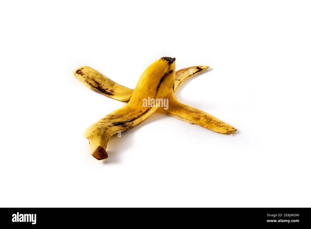 La buccia di banana isolato su sfondo bianco Foto Stock