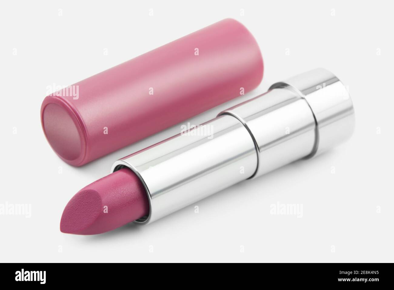 Care Lipstick rosa argento primo piano Foto Stock