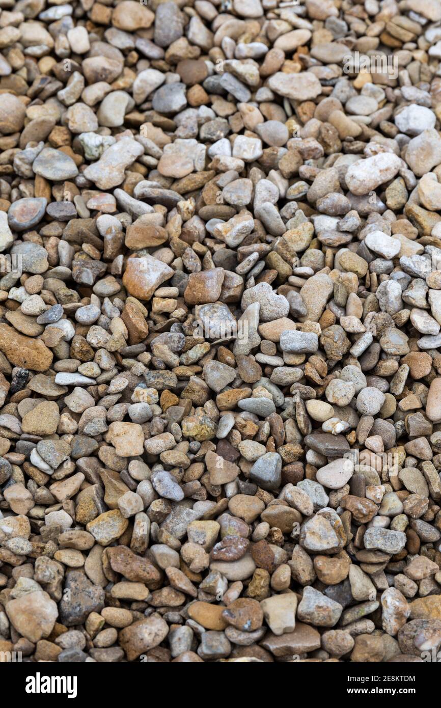 Primo piano di Cerney Shingle ghiaia in vendita presso un costruttore di commercianti in Inghilterra, Regno Unito Foto Stock