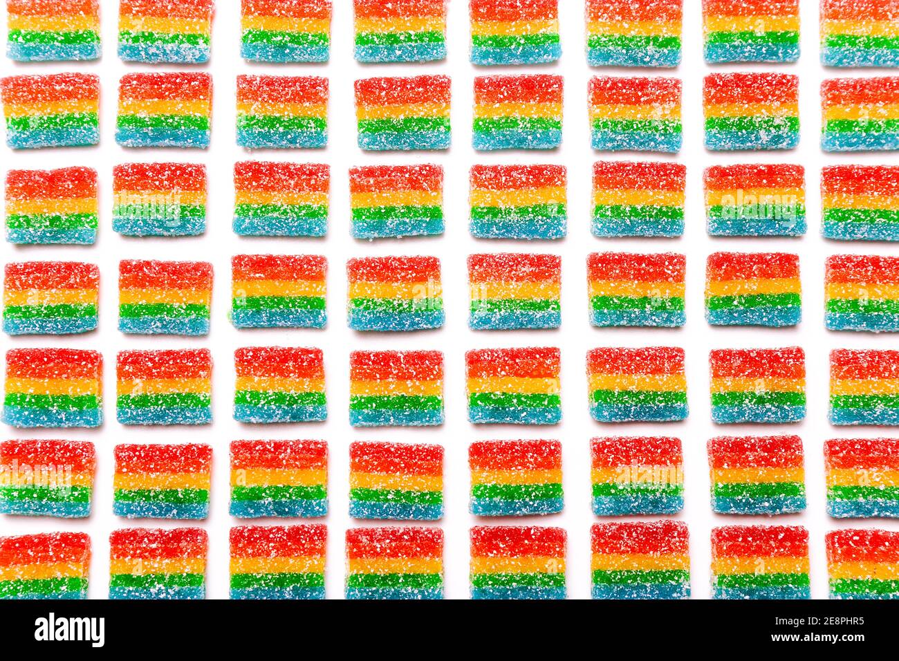 Arcobaleno succosa gummy candie sfondo. Modello da caramelle di gelatina. Foto Stock