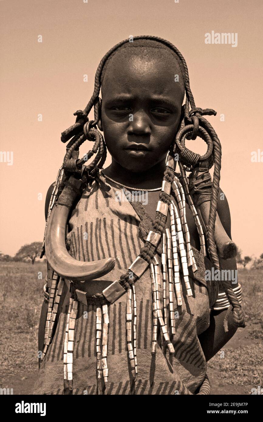 Mursi Tribe Girl Foto Stock