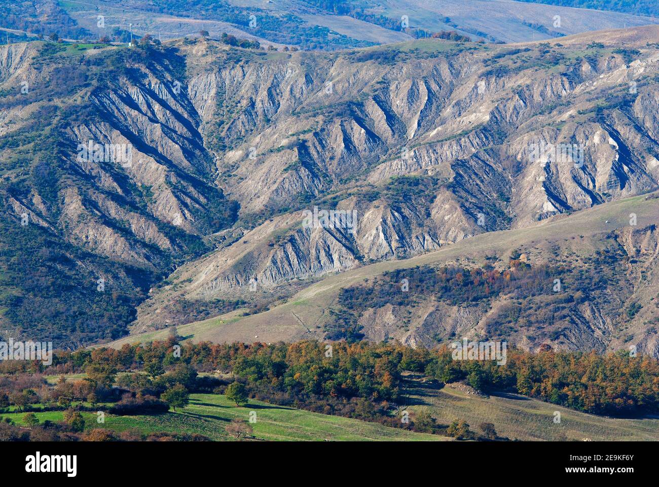 Paesaggio con badlands (calanchi) in Val d'Orcia, Toscana, Italia Foto Stock