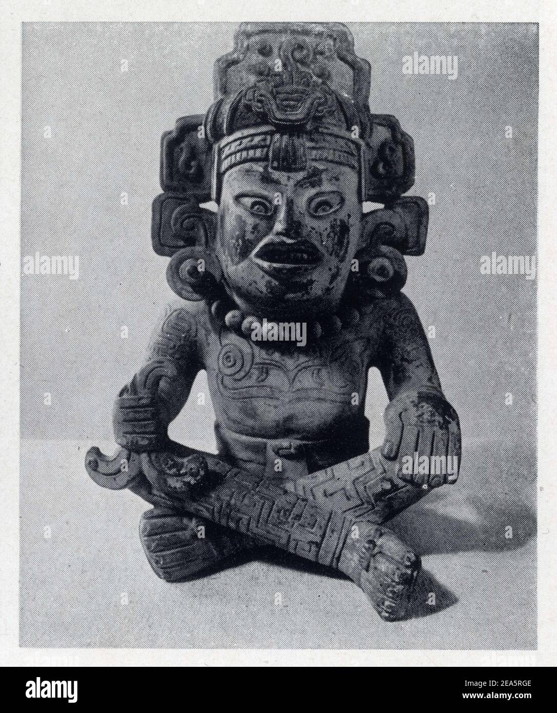 Art mexicain.Divinité Zapotèque,représentant le Prince des Fleurs,dieu de la Joie,de la Musique et de la Danse.Corps peint et tatoué avec motivi géomé Foto Stock