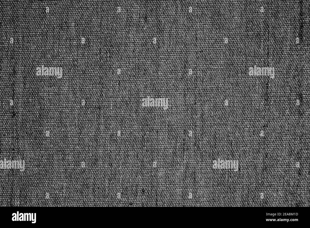 Sfondo tessuto scuro. Dettaglio di materiale tessile in tela. Foto Stock