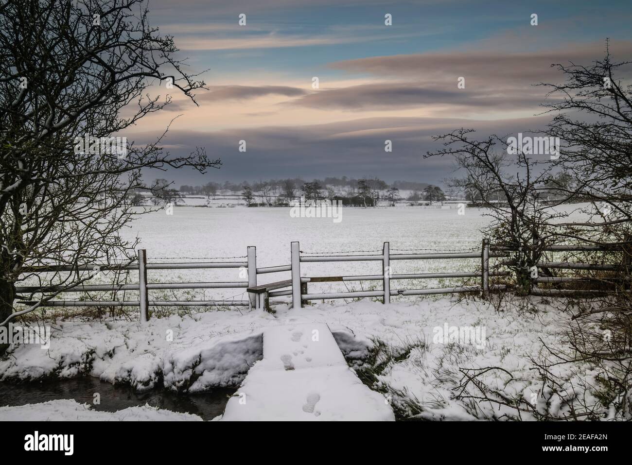 Stile in condizioni di inverno, Clitheroe, Ribble Valley, Lancashire, Regno Unito. Foto Stock