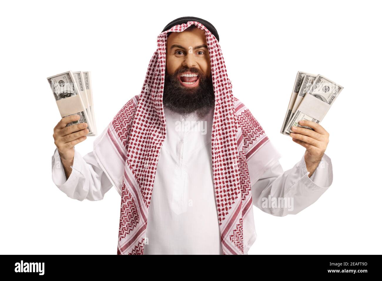Eccitato uomo arabo saudita tenendo mucchi di soldi isolati sfondo bianco Foto Stock