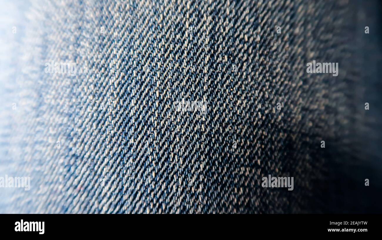 Primo piano di materiale jeans. Jeans texture sfondo. Texture jeans blu. Jeans denim texture. Foto Stock