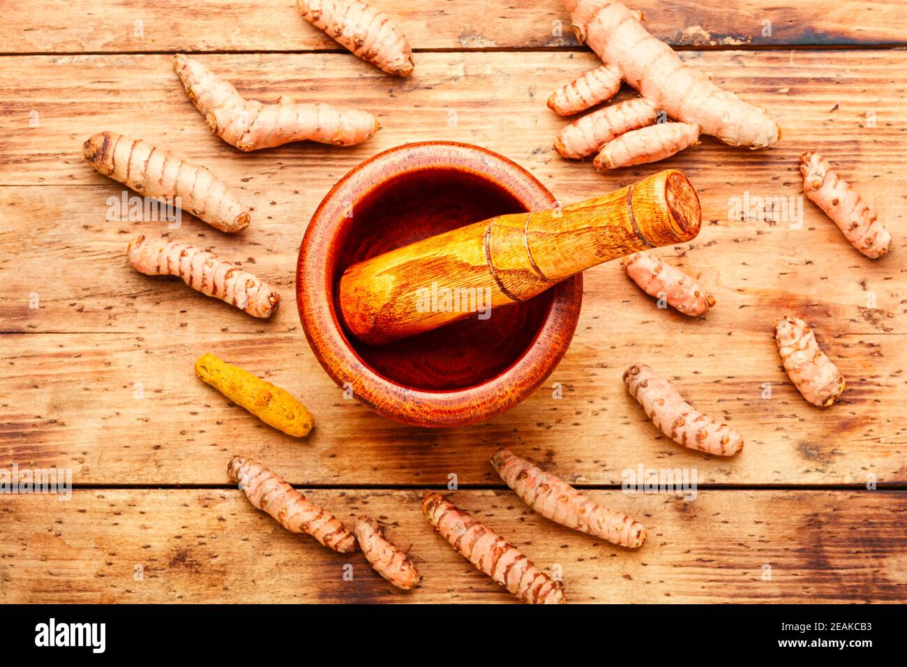 Curcuma in polvere e curcuma fresco Foto Stock