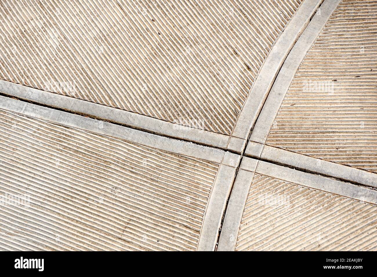 Prospettiva di calcestruzzo mattone pavimentazione strada. Livello di superficie Foto Stock