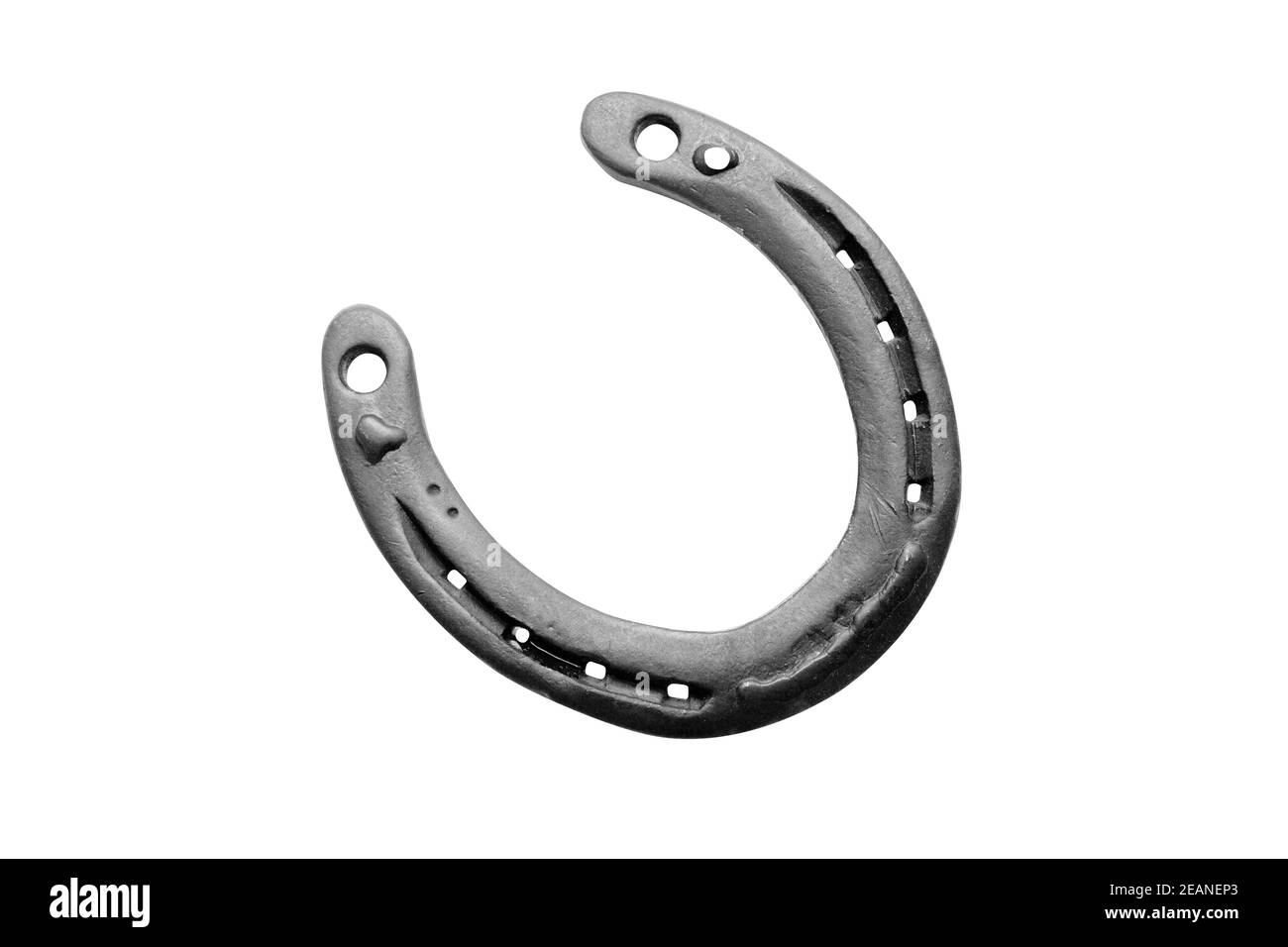 Horseshoe con fortunato trifoglio su sfondo bianco Foto Stock