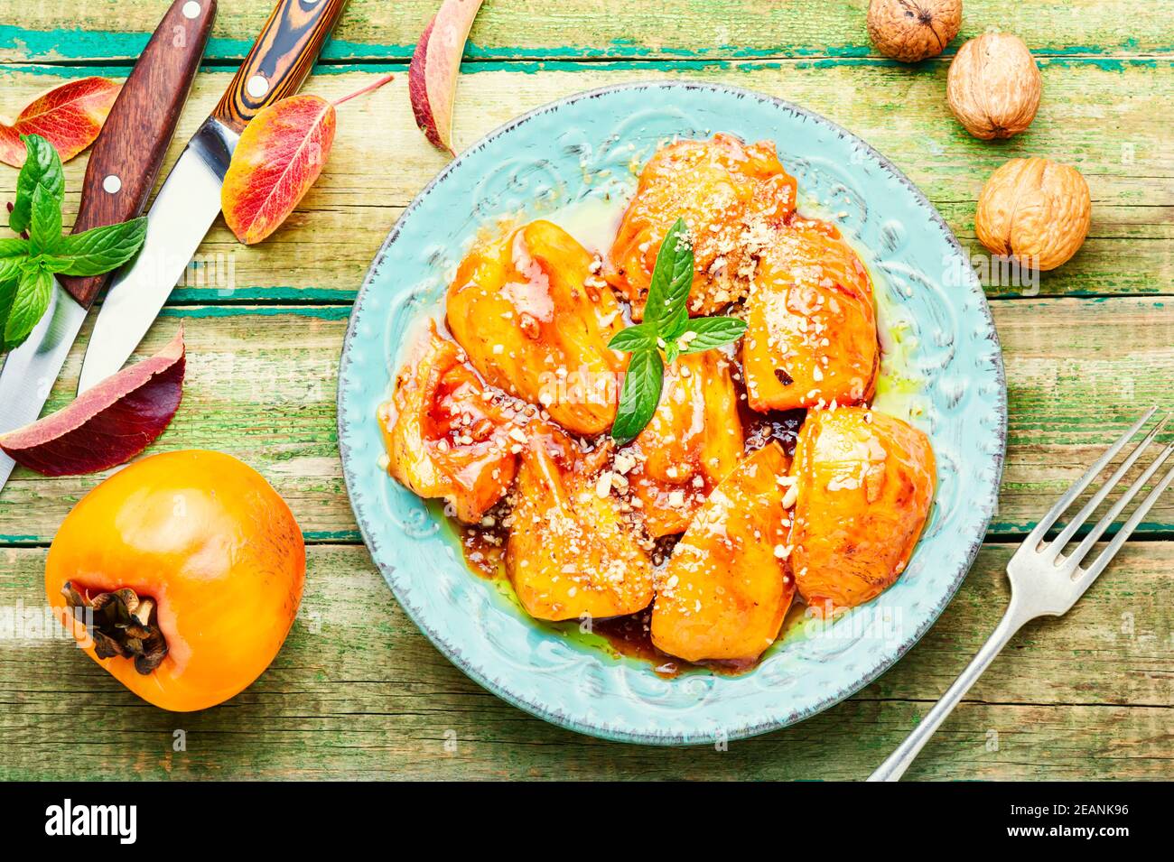 Pezzi di persimmon caramellato. Foto Stock