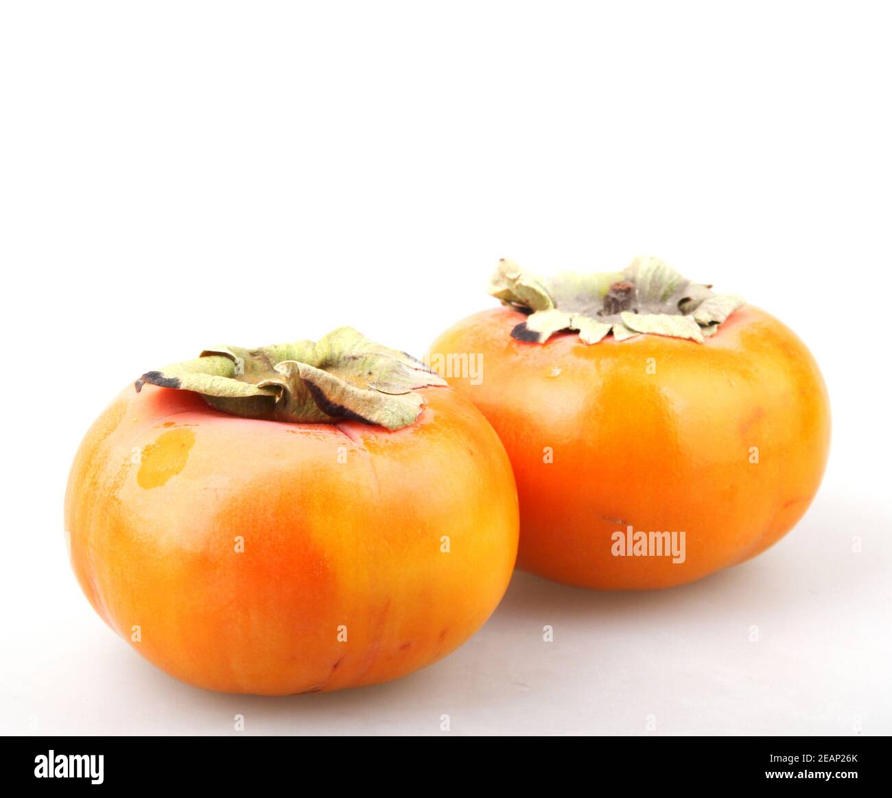 Fresche e mature kaki Foto Stock