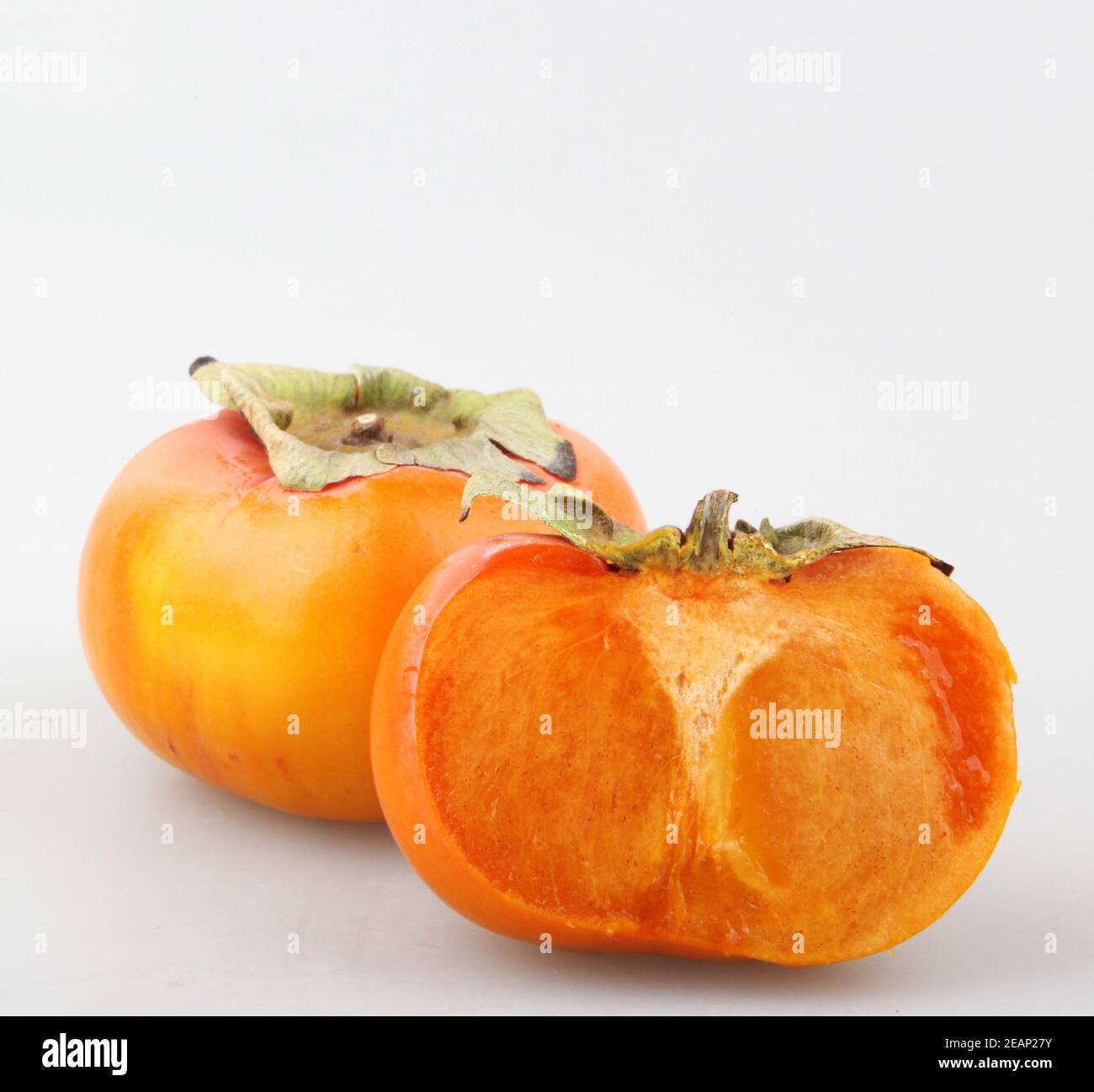 Fresche e mature kaki Foto Stock