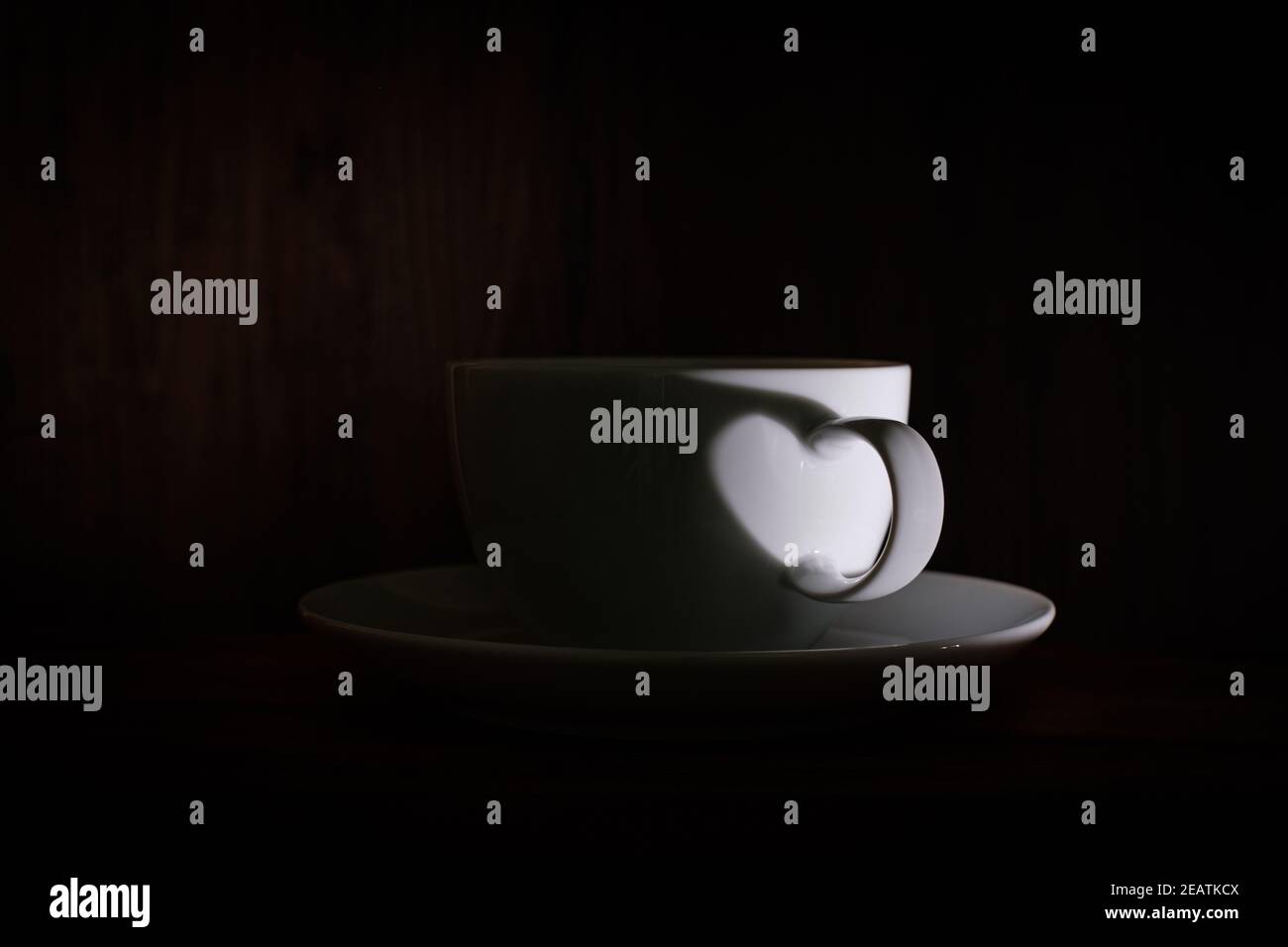 Forma del cuore in una tazza di caffè Foto Stock