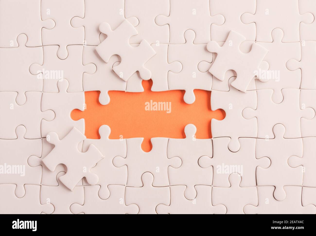 carta comune bianco jigsaw puzzle game texture incompleto o mancante pezzo Foto Stock