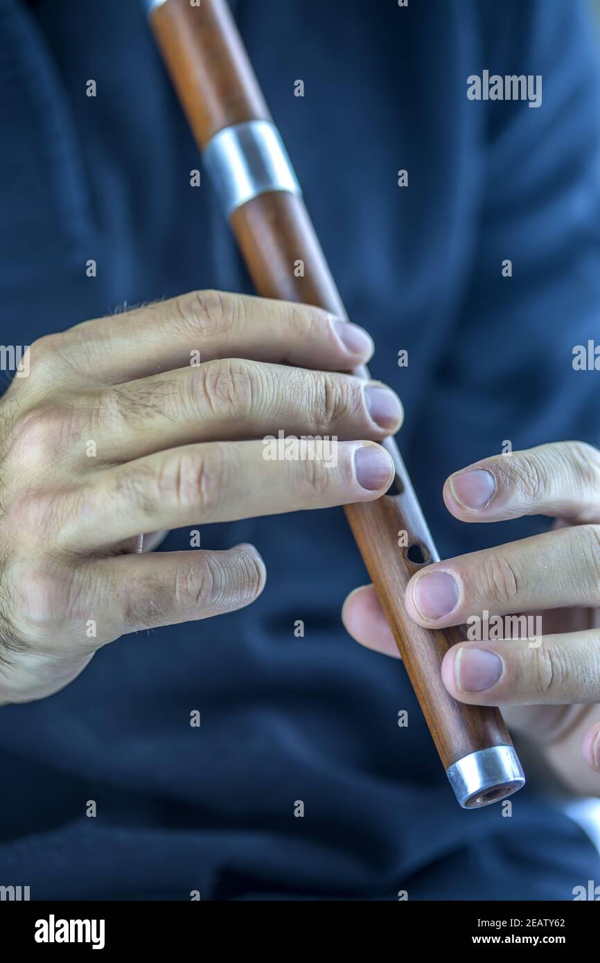 Flauto in legno player Foto Stock