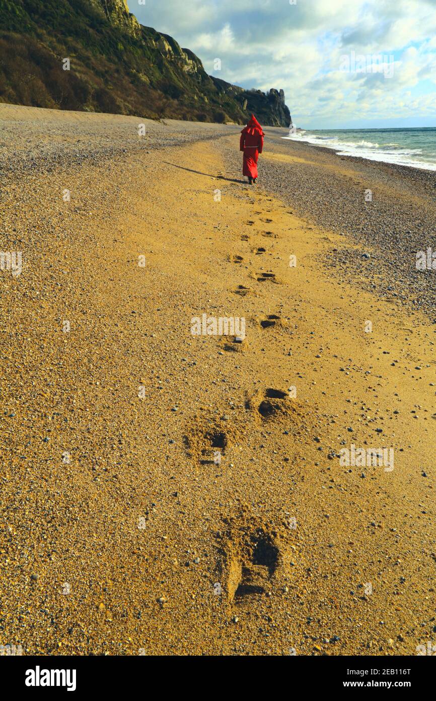 Footprint sulla spiaggia di sabbia a Branscombe, Devon sulla Jurassic Coast Foto Stock