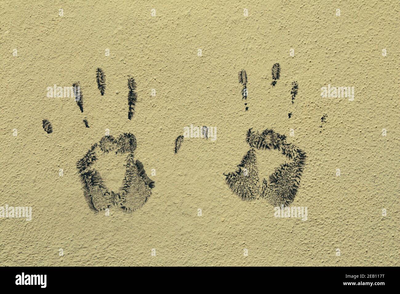 Stampa a mano sulla parete come sfondo Foto Stock